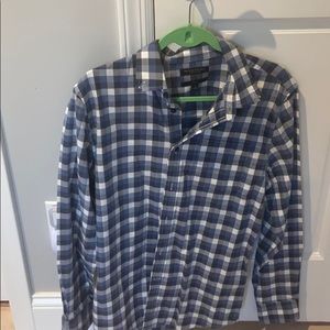 A blue plaid long sleeve shirt